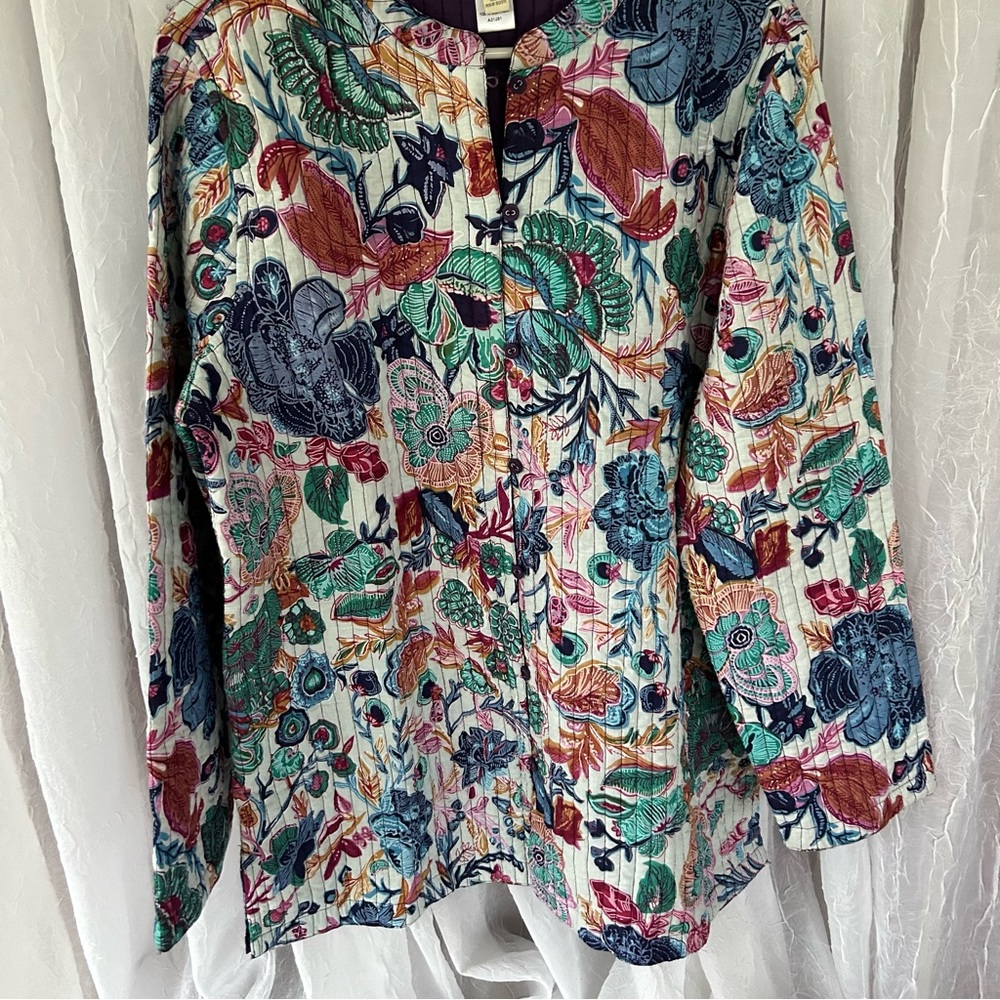 Appleseed’s Quilted Jacket, Boho Floral with a deep purple reverse side.